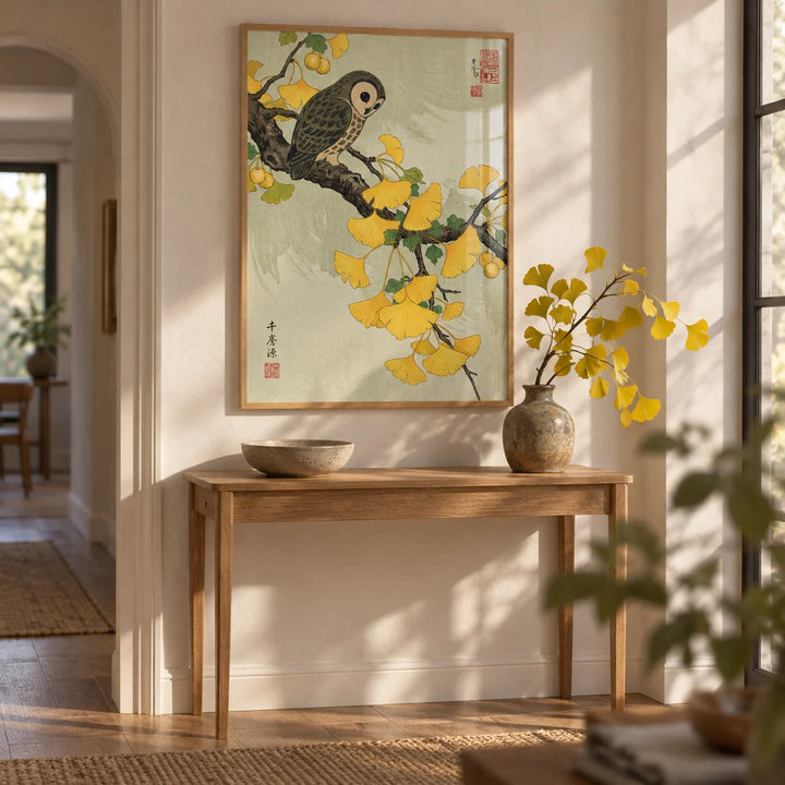 Owl and Ginkgo Print, framed on the wall of a calm hallway