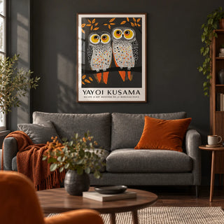 Owl Wall Art, framed on the wall of a cosy living room with a deep charcoal painted wall and a dark wood floor