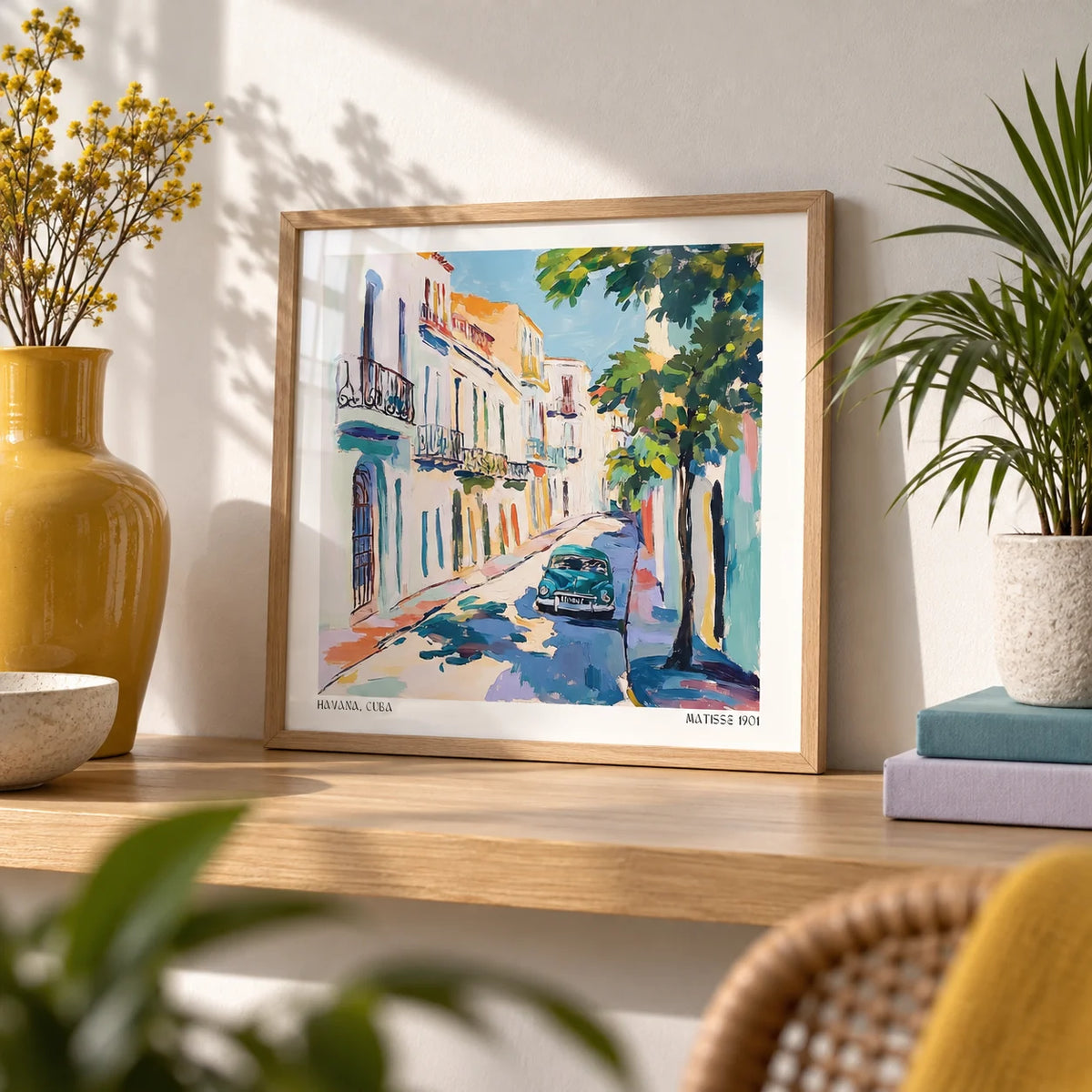 Paintings of Cuba, a small A4 framed print leaning on an oak shelf in a living room
