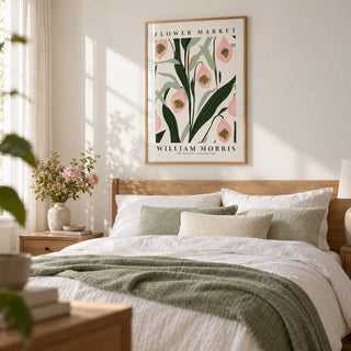 Paintings of Orchids, framed on the wall of a calm bedroom with a soft white wall
