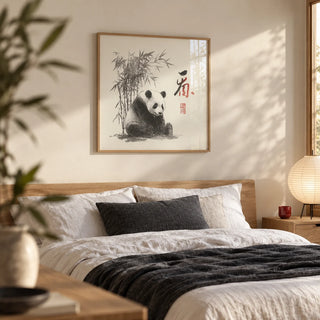 Panda Art Print, framed on the wall of a calm bedroom with a soft cream wall