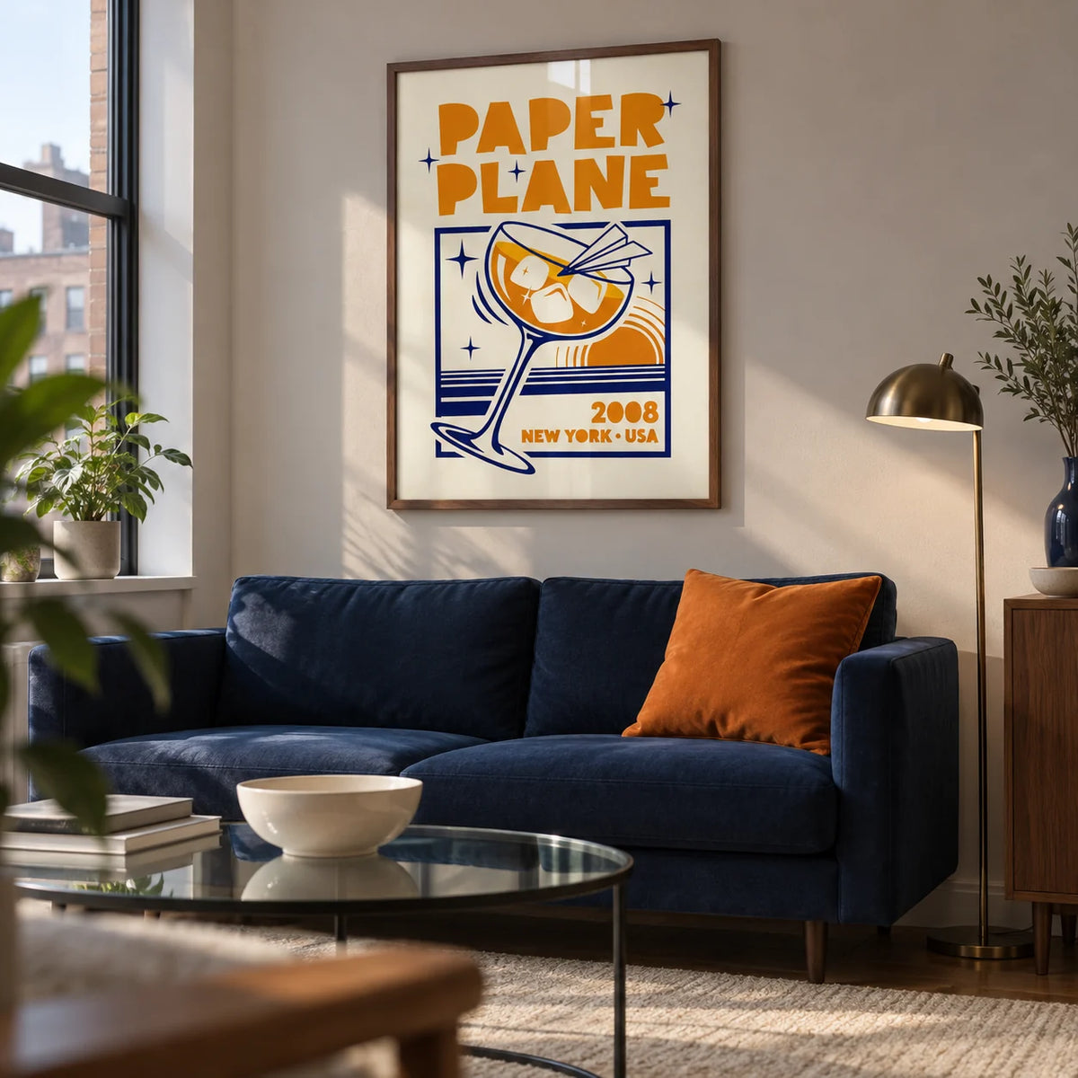 Paper Plane Cocktail Poster, framed on the wall of a modern living room in a UK city flat with a pale warm grey wall and walnut furniture