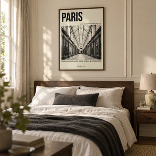 Parisian Passage Art Print, framed on the wall of a restful main bedroom in a Victorian terrace with a warm ivory wall and restrained panel mouldings