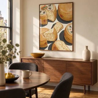 Parmegiano Reggiano Art, framed on the wall of a design-led dining room in a UK city flat with an ivory wall and warm wood flooring