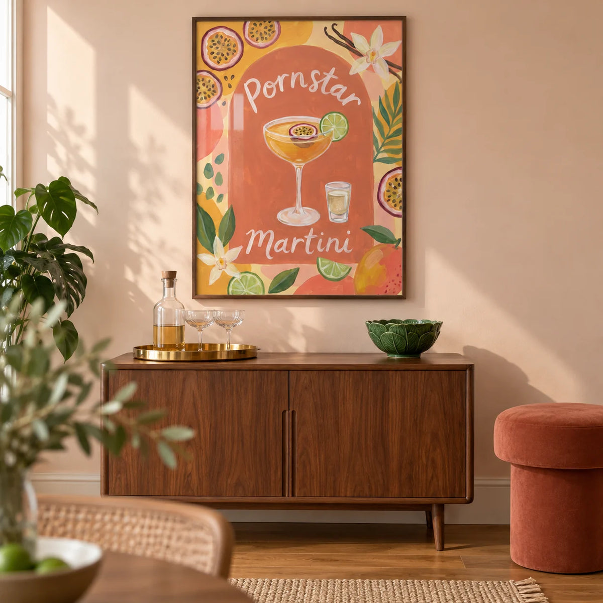 Passion Fruit Martini Poster, framed on the wall of a warm contemporary home bar in a UK flat with a pale peach wall and oak floor in a living room