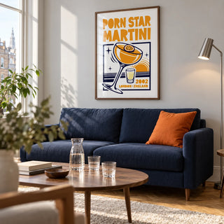 Passion Fruit Martini Print, framed on the wall of a bright modern living room in a UK city flat with a pale grey wall and oak parquet
