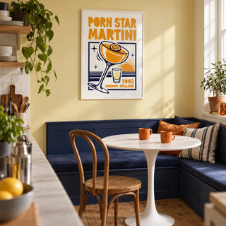 Passion Fruit Martini Print, framed on the wall of a compact kitchen breakfast nook in a first UK flat for a cocktail enthusiast (25-30)