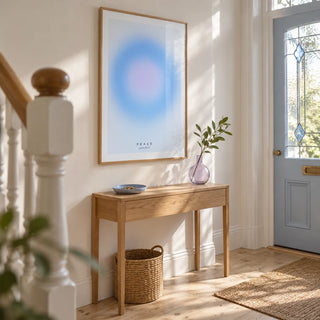 Peace Poster, framed on the wall of a bright entrance hallway in a UK Victorian terrace with white walls and restored pale timber floorboards