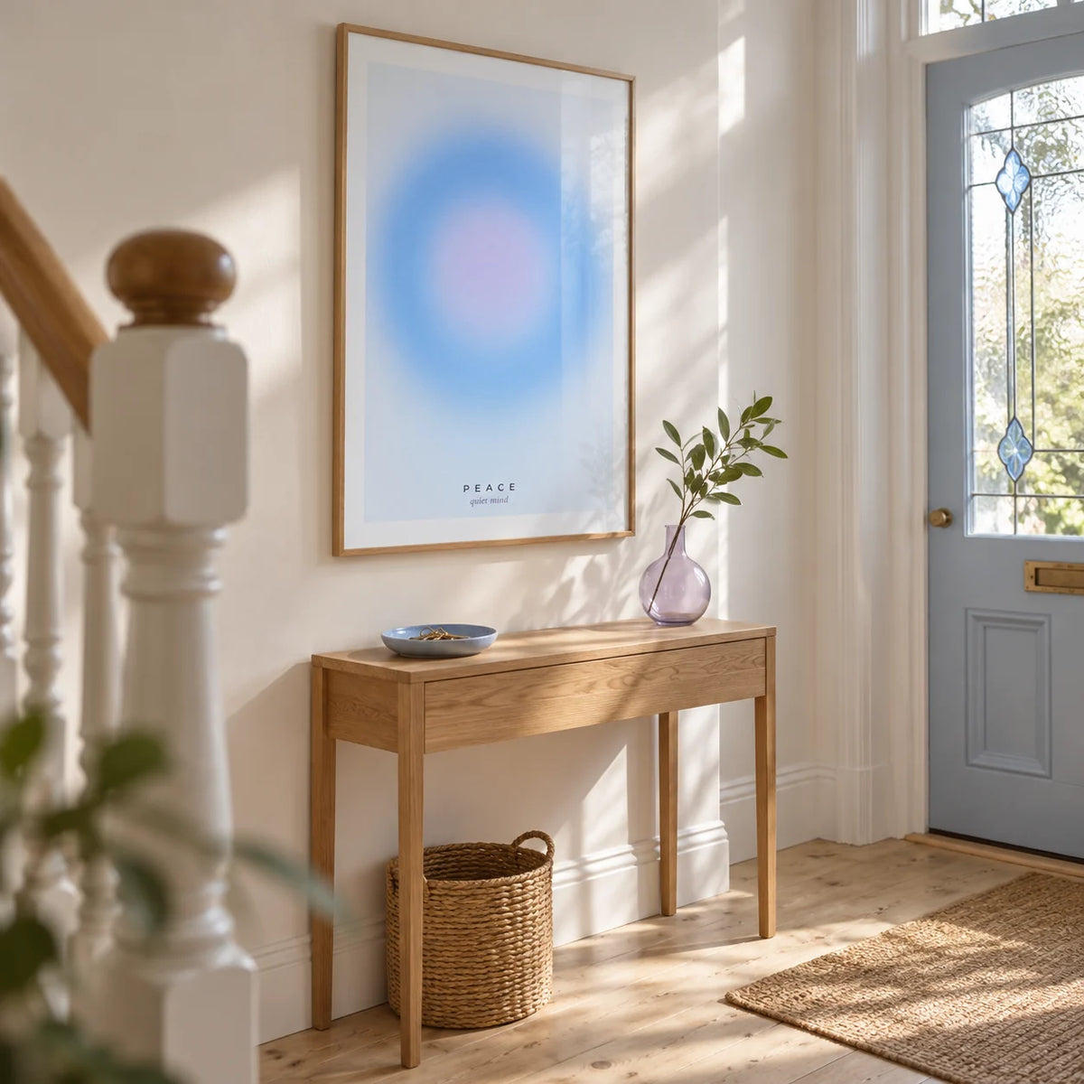 Peace Poster, framed on the wall of a bright entrance hallway in a UK Victorian terrace with white walls and restored pale timber floorboards