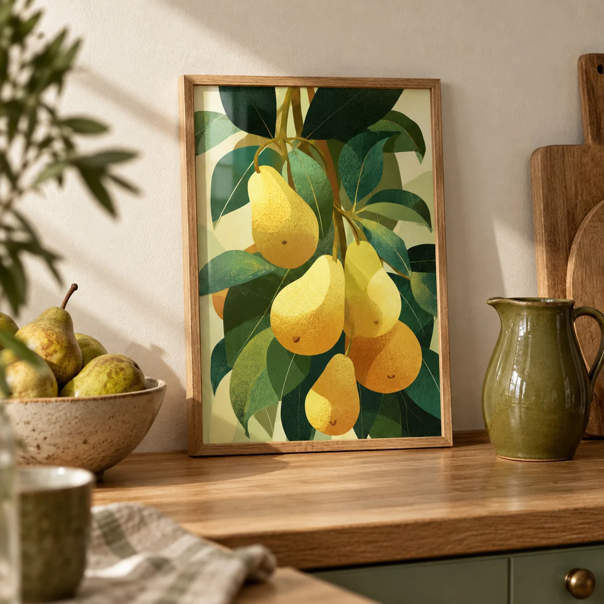 Pear Wall Art, a small A4 framed print leaning on an oak worktop in a kitchen