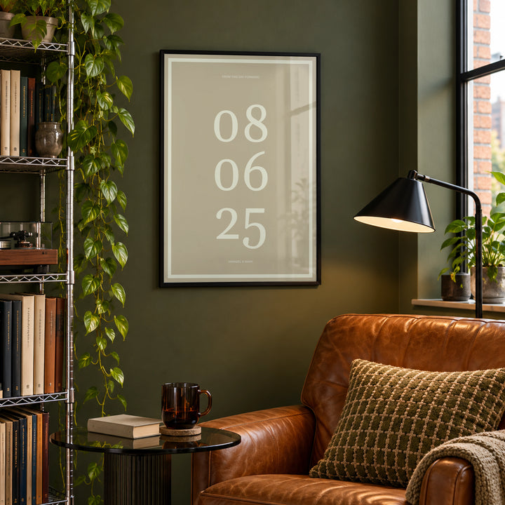 Anniversary Date Print in a city-apartment reading corner, black frame