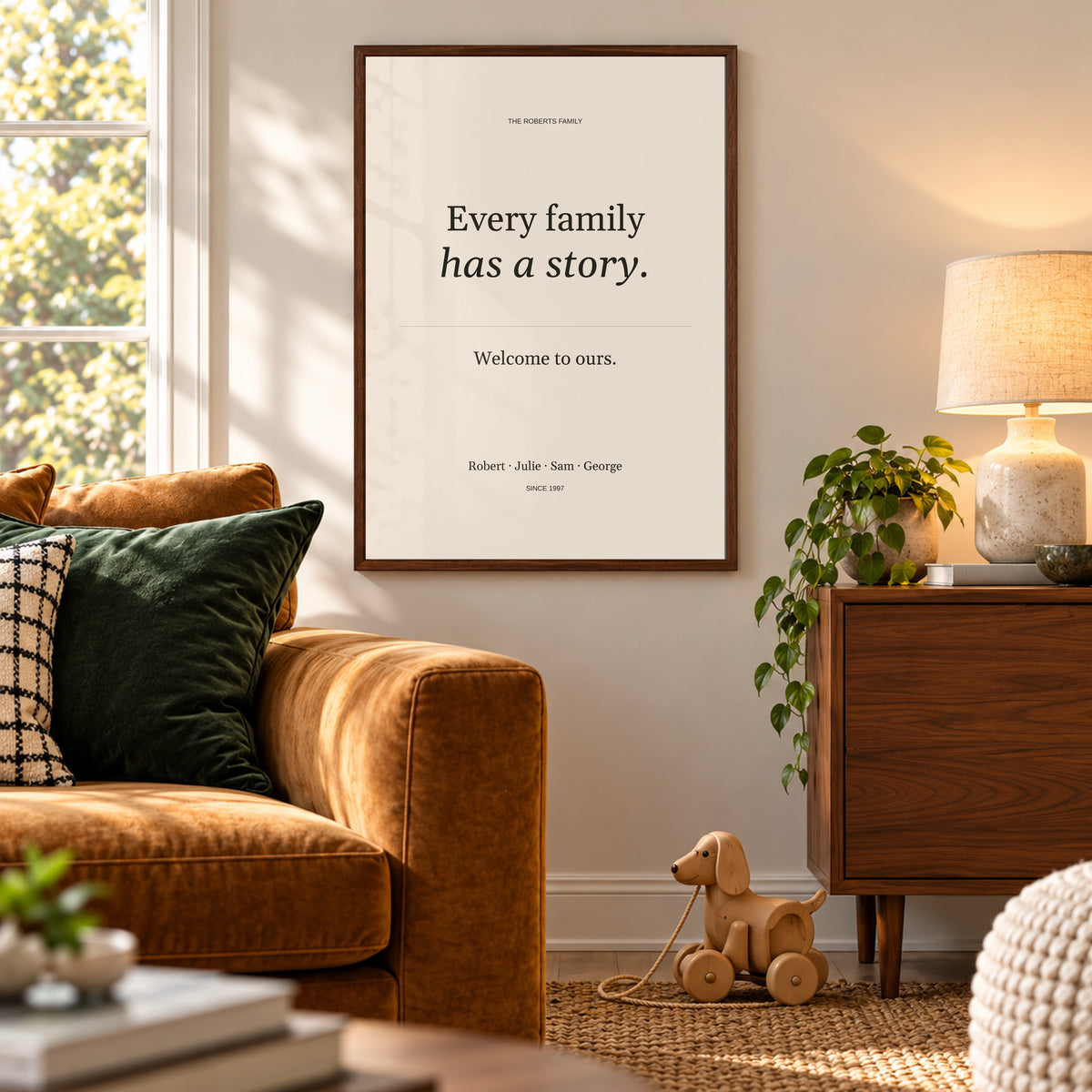 Family Story Poster in a cosy family living room, dark wood frame