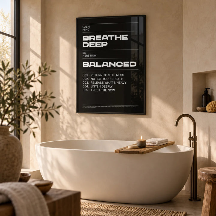 Phrases for Wall Art, framed on the wall of a calm spa bathroom with warm beige microcement walls
