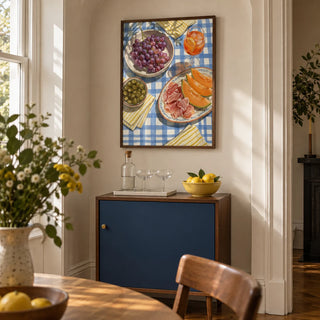 Picnic Decor Wall Art, framed on the wall of a compact home bar corner in a Victorian terrace dining room with a warm white wall and a shallow arched niche