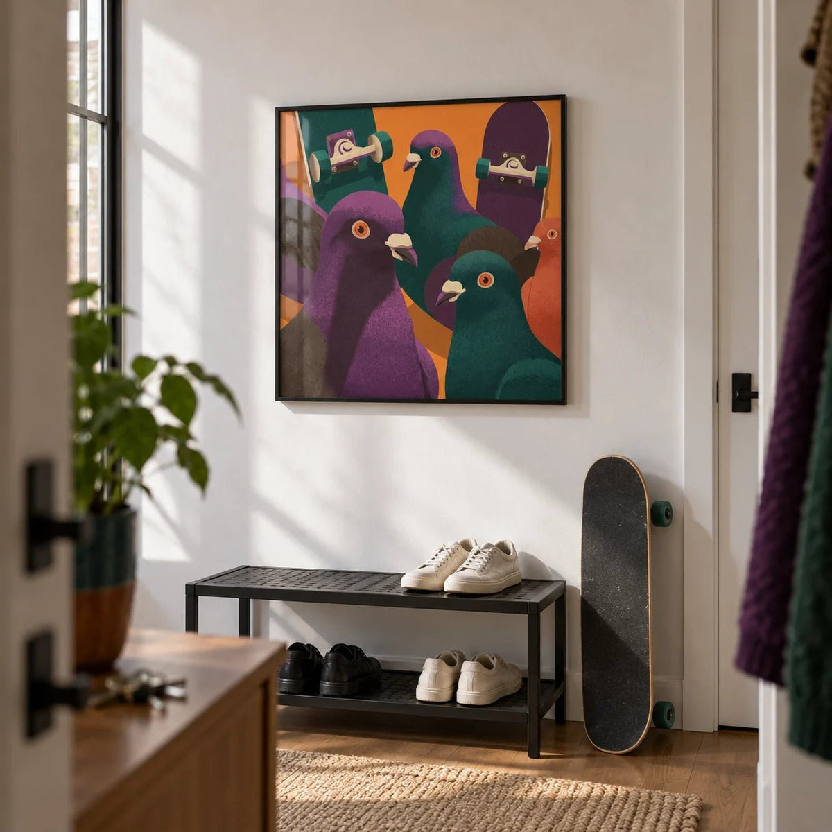 Pigeon Skateboard Art, framed on the wall of a urban flat hallway with a white wall