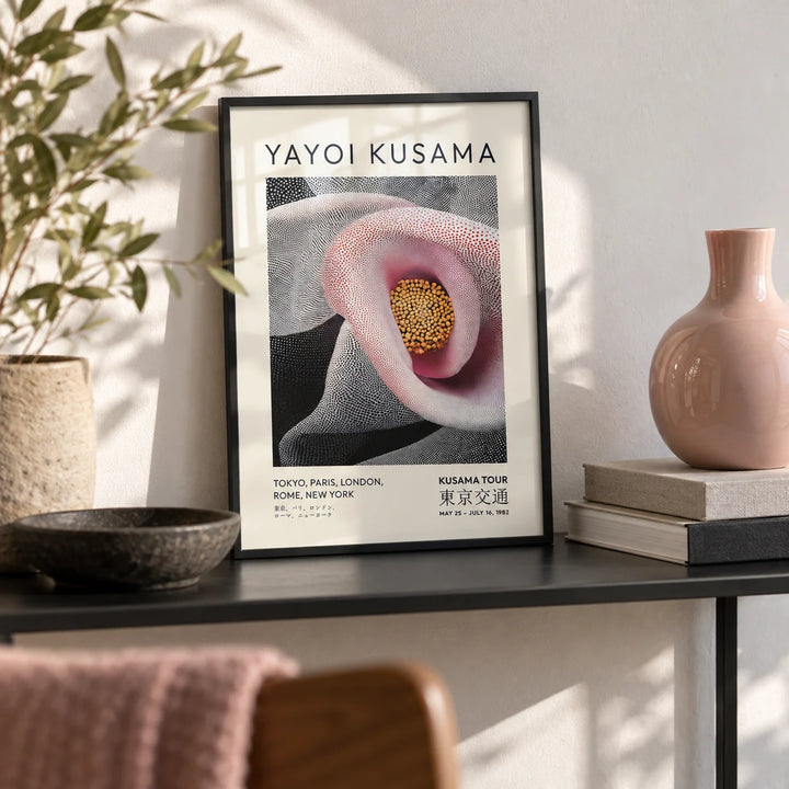 Pink Abstract Artwork, a small A4 framed print leaning on a slim black metal shelf in a living room