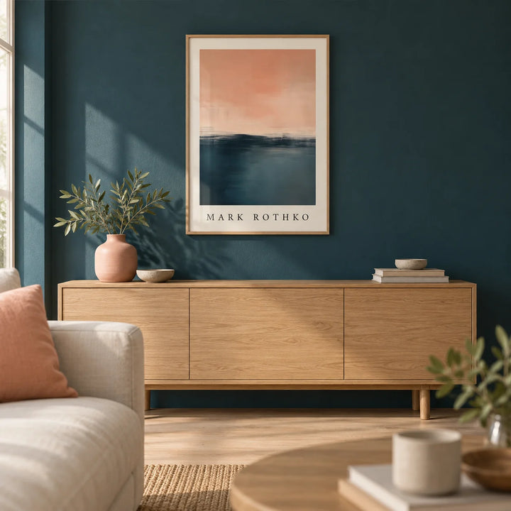 Pink and Blue Painting, framed on the wall of a calm living room with a deep teal painted wall and a pale oak floor