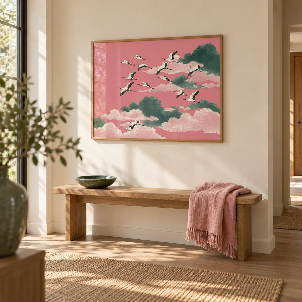 Pink Crane Wall Art, framed on the wall of a calm hallway with a warm white wall