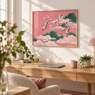 Pink Crane Wall Art, framed on the wall of a soft feminine home office with a white wall