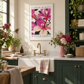 Pink Floral Prints, framed on the wall of a pretty utility room with deep green painted cabinets and a warm white wall in a laundry room