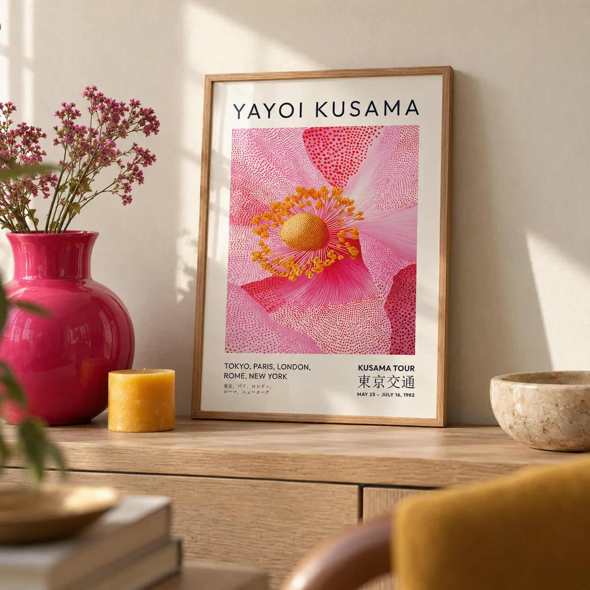 Pink Floral Wall Art, a small A4 framed print leaning on a pale oak shelf in a living room