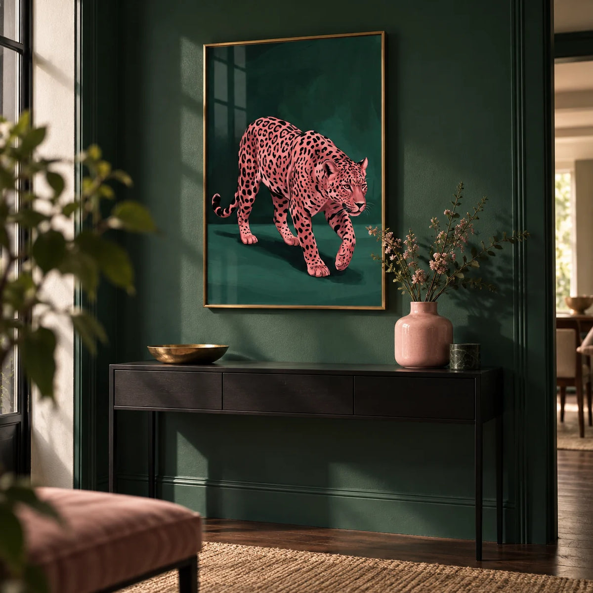 Pink Leopard Wall Art, framed on the wall of a dark green hallway