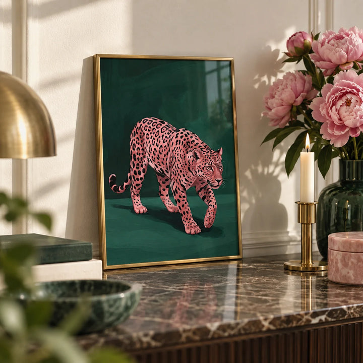 Pink Leopard Wall Art, a small A4 framed print leaning on a marble side table in a hallway