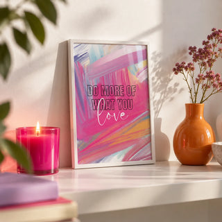 Pink Motivational Posters, a small A4 framed print leaning on a white shelf in a living room