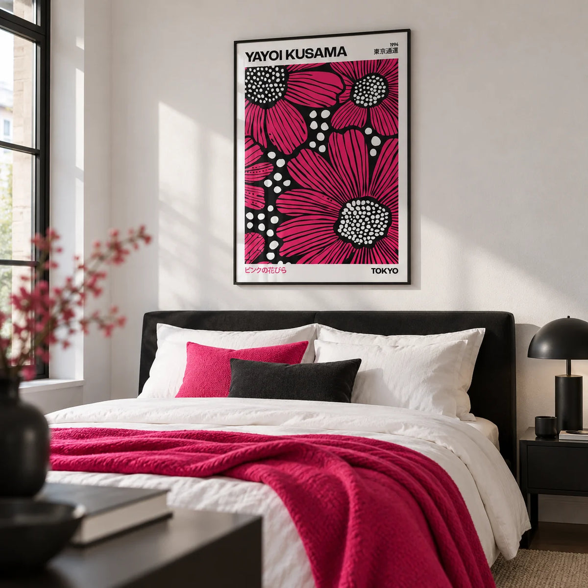 Pink Posters, framed on the wall of a crisp monochrome bedroom with a white wall