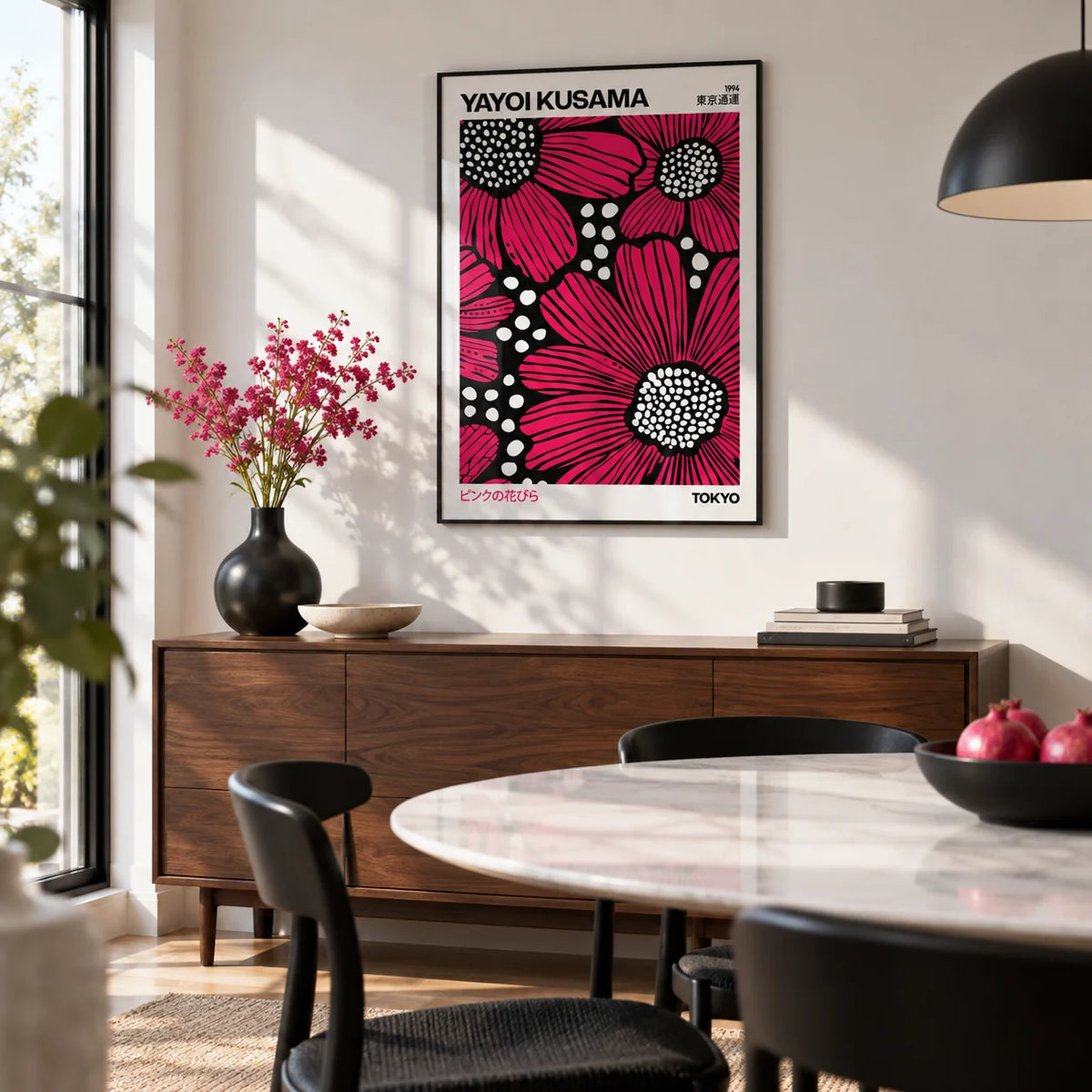 Pink Posters, framed on the wall of a modern dining room with a white wall