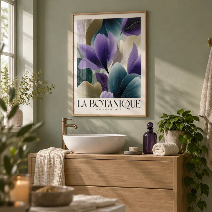 Plant Poster, framed on the wall of a calm spa-like bathroom with a plain sage green wall and a white basin on an oak vanity