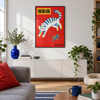 Playful Cat Art Print, framed on the wall of a modern city-flat living room with white walls