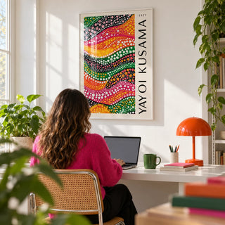 Polka Dot Art, framed on the wall of a bright home office with a white wall