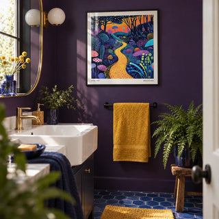 Polka Dot Pop Art, framed on the wall of a bold modern bathroom with a deep purple painted wall and a white basin
