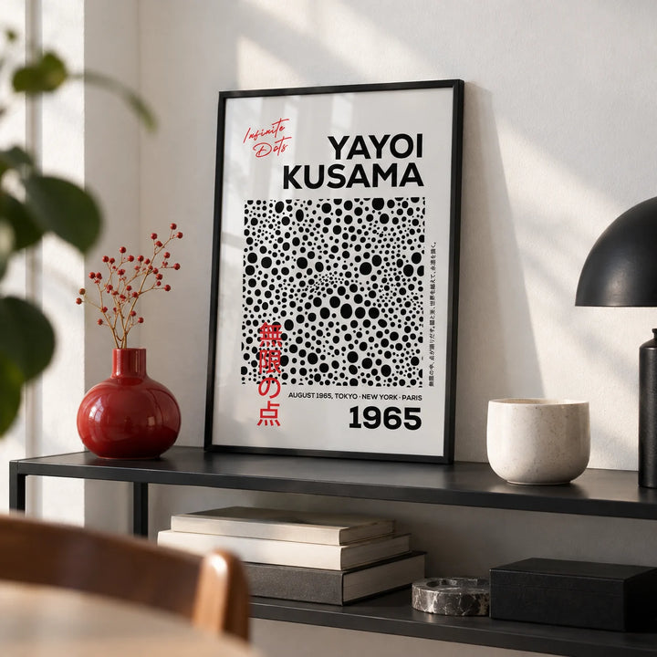 Polka Dots Art, a small A4 framed print leaning on a black metal shelf in a living room