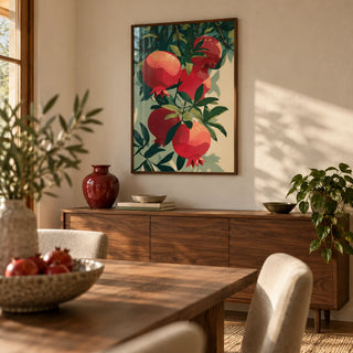 Pomegranate Art Print, framed on the wall of a warm dining room with a soft beige wall
