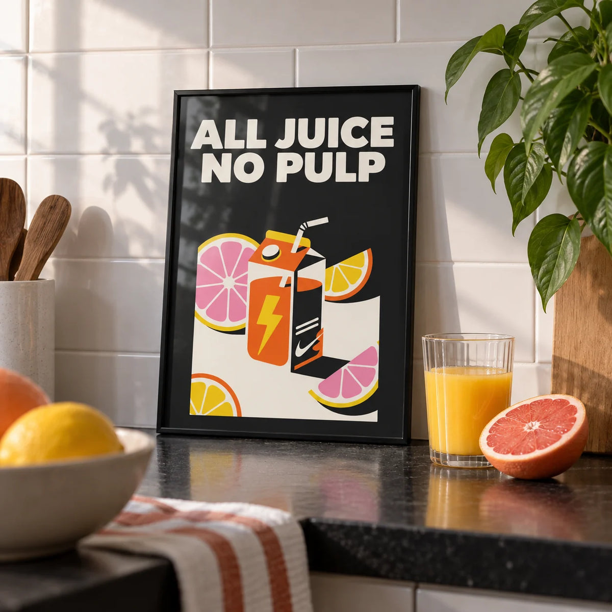 Pop Art Poster, a small A4 framed print leaning on a black kitchen worktop