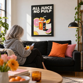 Pop Art Poster, framed on the wall of a young city flat living room with a white wall and a light oak floor