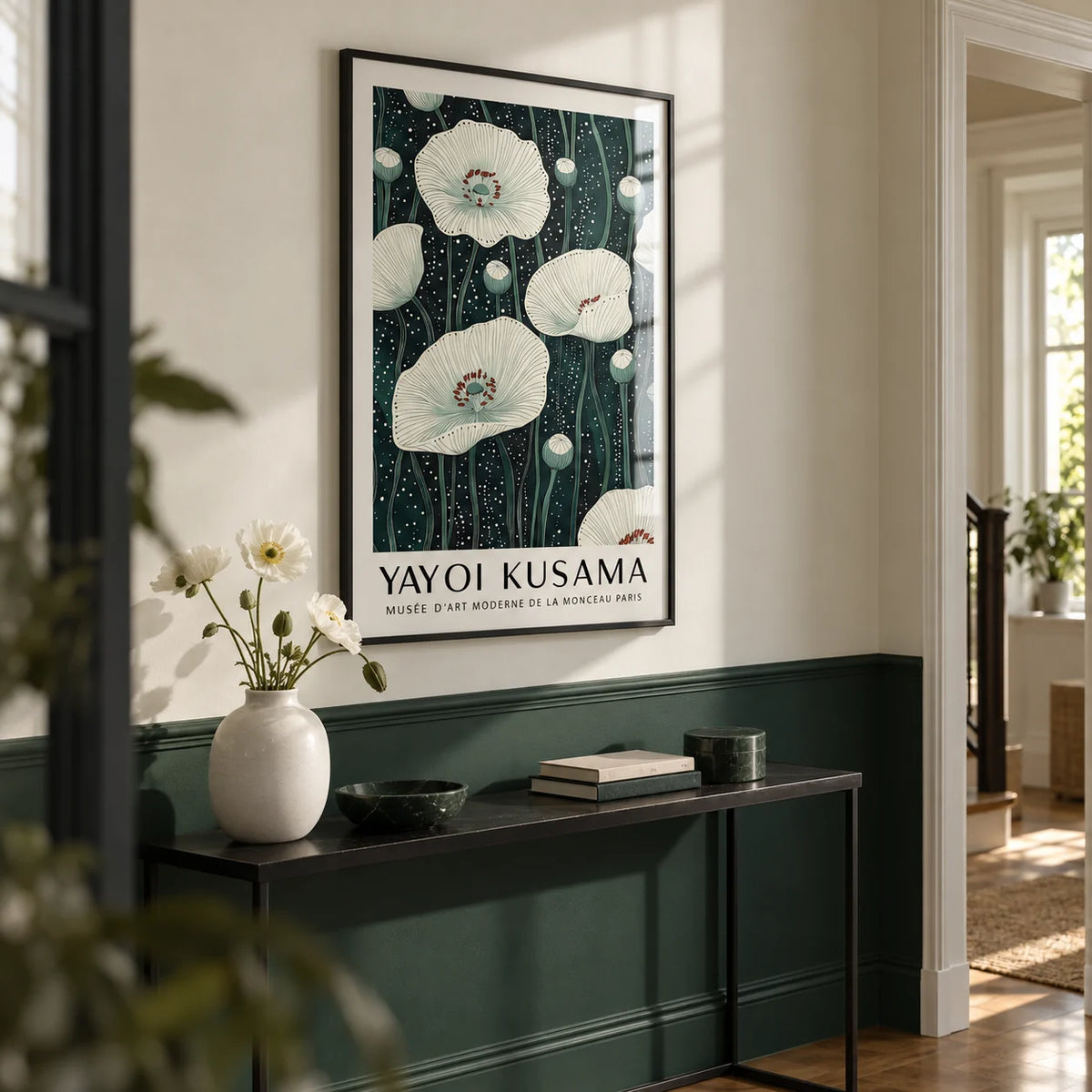 Poppy Prints, framed on the wall of a calm hallway with a dark green painted lower wall and a white upper wall
