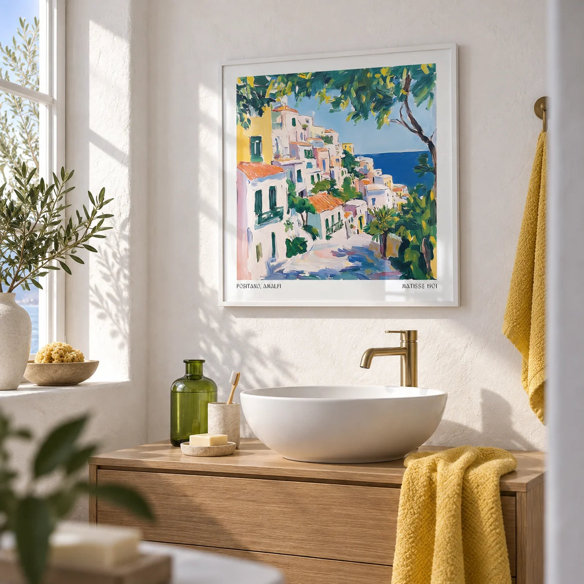 Positano Art, framed on the wall of a bright white bathroom with plaster walls
