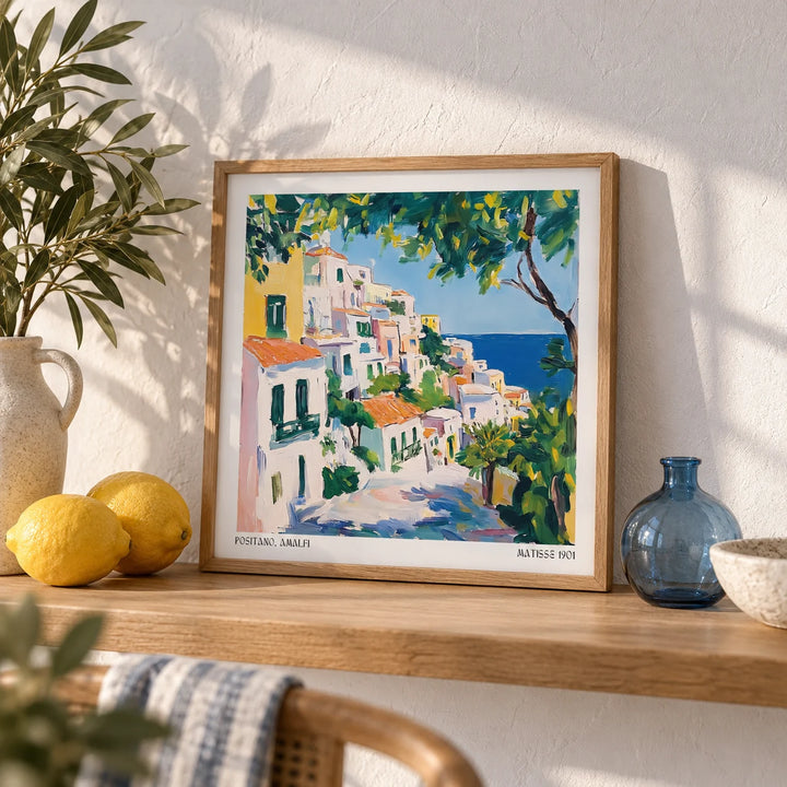 Positano Art, a small A4 framed print leaning on an oak shelf in a living room
