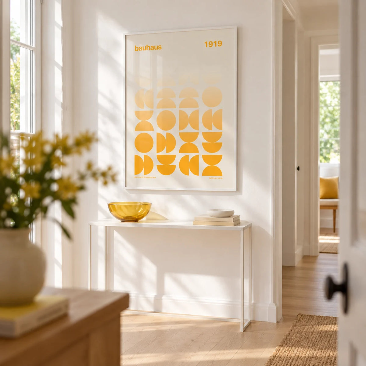 Posters Bauhaus, framed on the wall of a crisp white hallway with a pale oak floor
