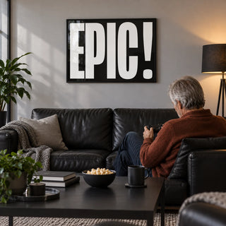 Posters Bold Font, framed on the wall of a modern man cave with a light grey wall in a living room