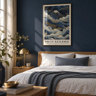 Posters from Japan, framed on the wall of a calm bedroom with a deep navy painted wall