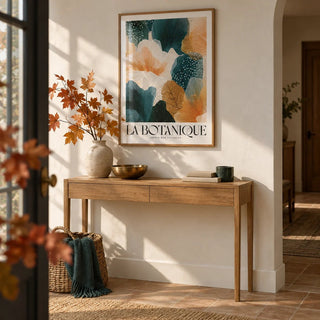 Posters of Autumn, framed on the wall of a calm entryway