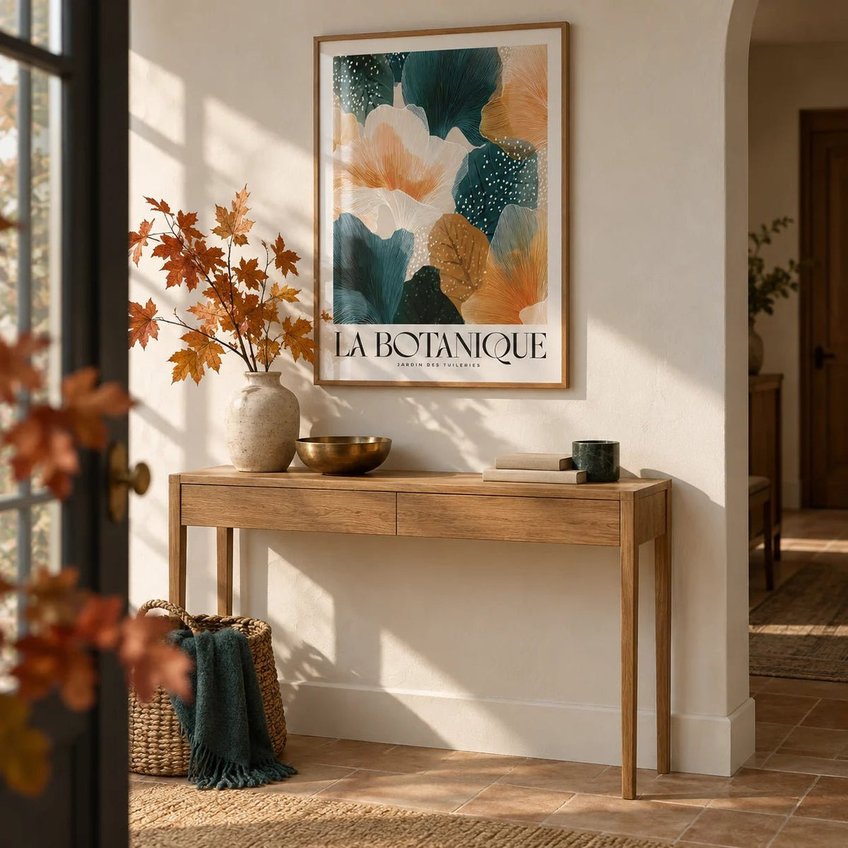 Posters of Autumn, framed on the wall of a calm entryway