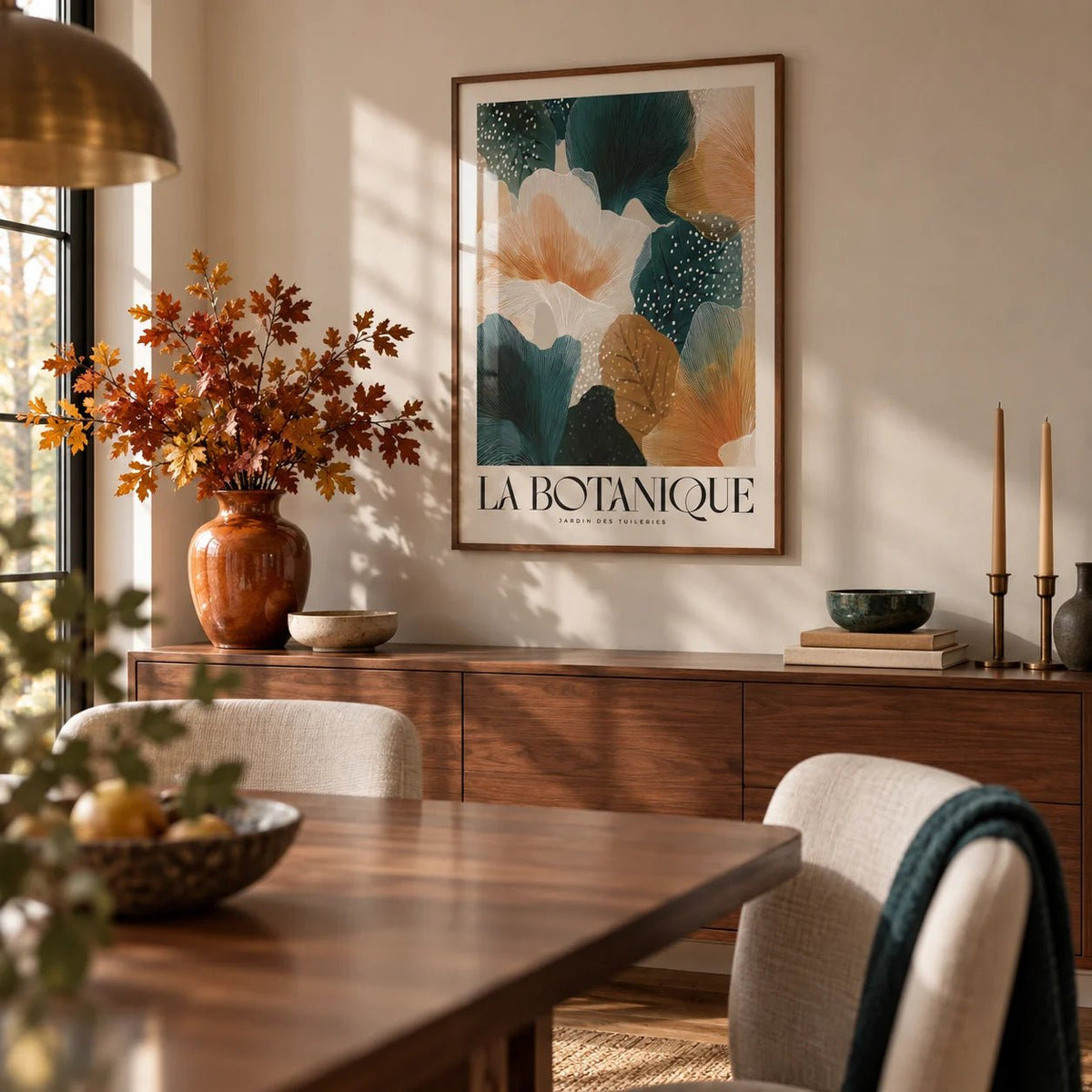 Posters of Autumn, framed on the wall of a warm dining room