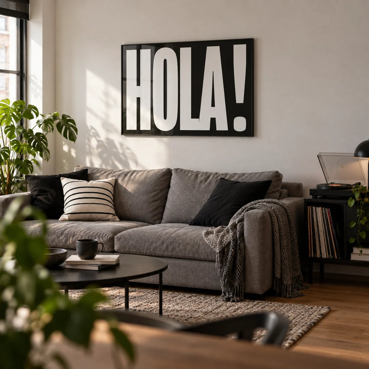 Posters with Typography, framed on the wall of a first-flat living room (age 22-28)