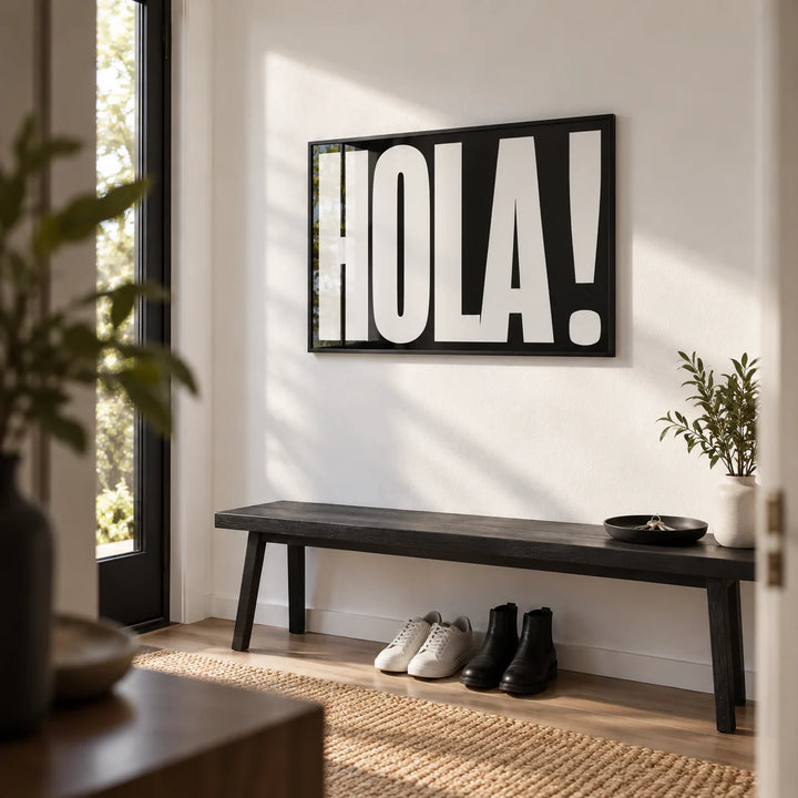 Posters with Typography, framed on the wall of a modern hallway by the front door
