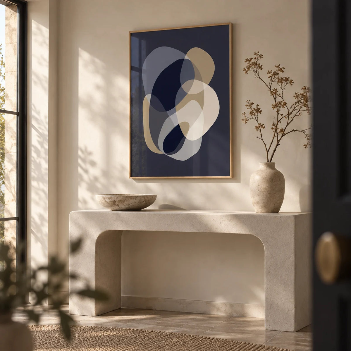 Prints Abstract Art, framed on the wall of a calm entryway